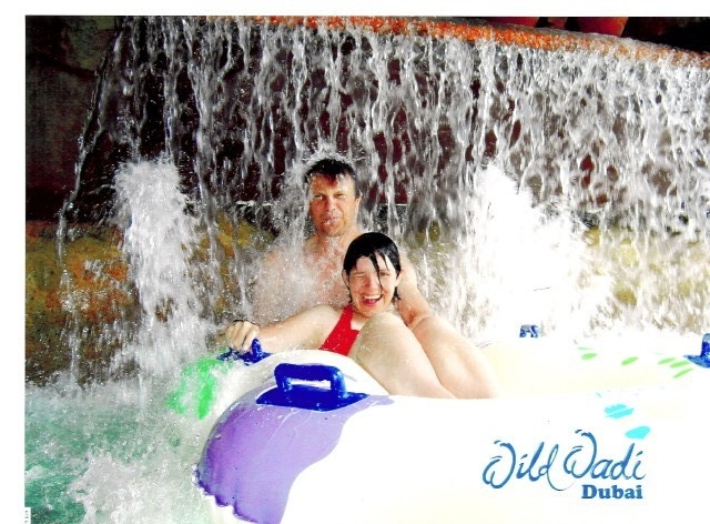 Under a waterfall at the Wild Wadi in Dubai
