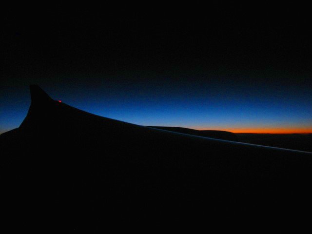 Sunrise flying into Dubai